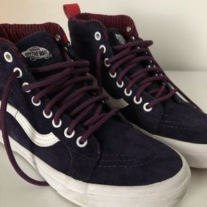 Blue and red high top vans